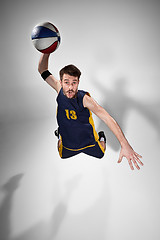 Image showing Full length portrait of a basketball player with ball