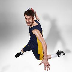 Image showing Full length portrait of a basketball player with ball