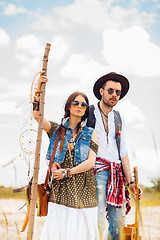 Image showing Man and woman as boho hipsters against blue sky