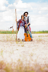 Image showing Man and woman as boho hipsters against blue sky