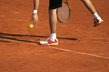 Image showing Tennis player preparing for service