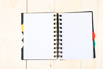 Image showing notepad with pen isolated