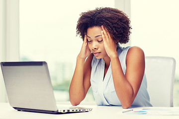 Image showing african woman with laptop at office