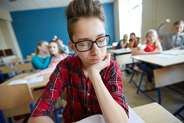 Image showing students gossiping behind classmate back at school