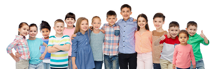 Image showing group of happy smiling children hugging