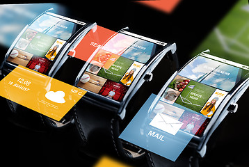 Image showing close up of smart watches with news application