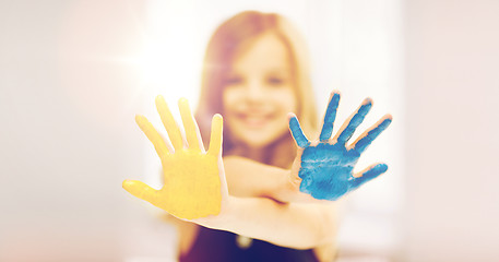 Image showing girl showing painted hands