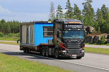 Image showing Scania R500 Transports Portable Cabin Along Motorway