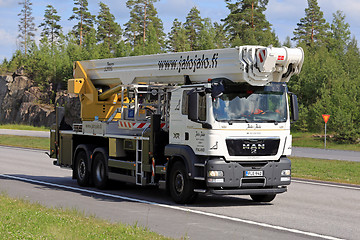 Image showing White MAN TGS Boom Truck on the Road