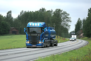 Image showing Blue Scania R580 High Beam Lights on the Road