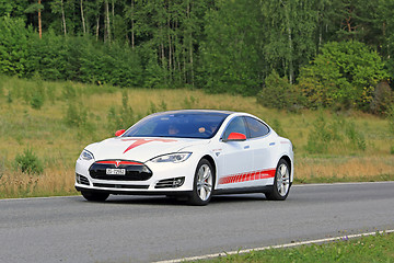 Image showing Tesla Model S Unique Design Electric Car on Green Summer Road 