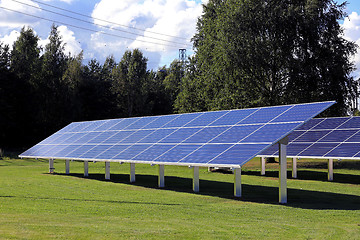 Image showing Solar Panels on Green Grass Field