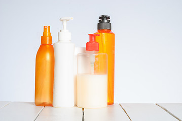 Image showing Group of cosmetic bottles isolated on white