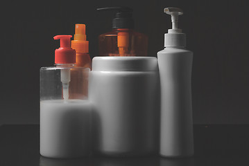 Image showing Group of cosmetic bottles isolated on white