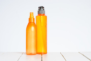 Image showing Group of cosmetic bottles isolated on white