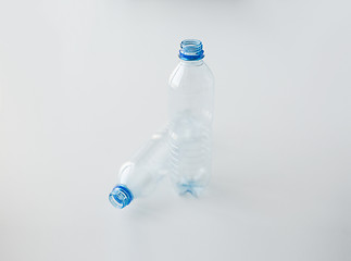 Image showing close up of empty used plastic bottles on table
