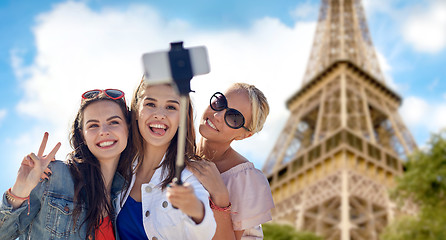 Image showing group of smiling women taking selfie in paris