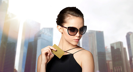 Image showing beautiful young woman in elegant black sunglasses