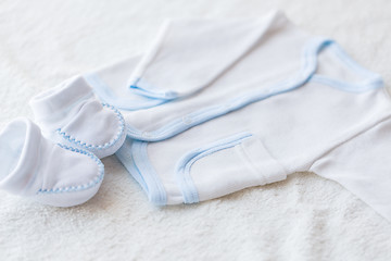 Image showing close up of baby boys clothes for newborn on table