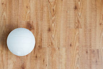 Image showing close up of volleyball ball on wooden floor