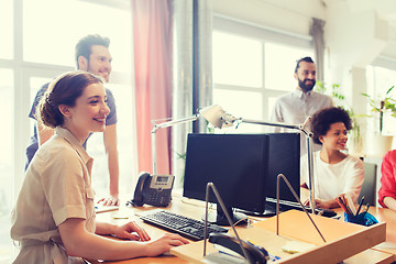 Image showing happy creative team in office