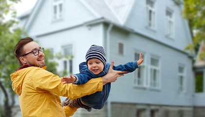 Image showing father with son playing and having fun outdoors