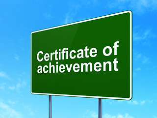 Image showing Studying concept: Certificate of Achievement on road sign background