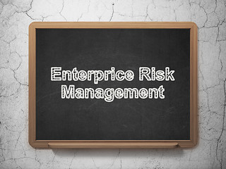 Image showing Finance concept: Enterprice Risk Management on chalkboard background