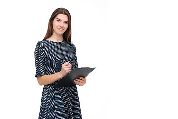 Image showing Portrait of smiling business woman with pen and paper folder