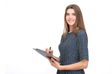 Image showing Portrait of smiling business woman with pen and paper folder