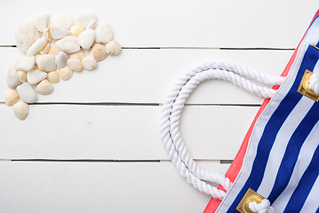 Image showing beach accessories on wooden board