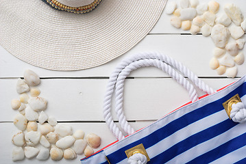 Image showing beach accessories on wooden board