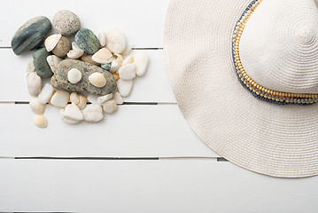 Image showing beach accessories on wooden board