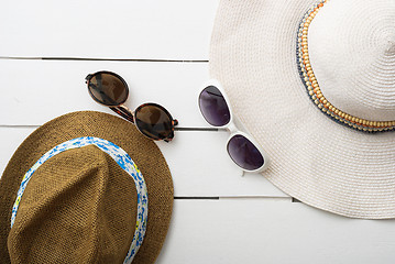 Image showing beach accessories on wooden board