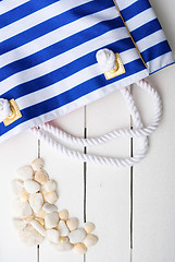 Image showing beach accessories on wooden board
