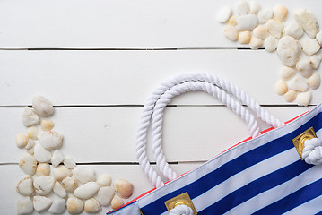 Image showing beach accessories on wooden board