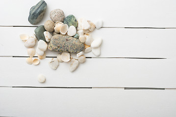 Image showing beach accessories on wooden board