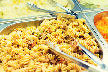 Image showing close up of pasta and dishes on catering tray