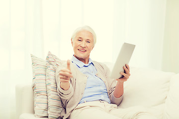 Image showing senior woman with tablet pc showing thumbs up 