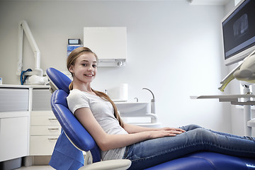 Image showing happy patient girl at dental clinic office