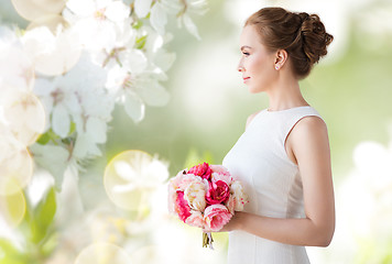 Image showing bride or woman in white dress with flower bunch