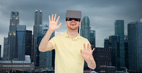 Image showing happy man in virtual reality headset or 3d glasses