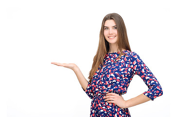 Image showing Woman showing something with open hand palm