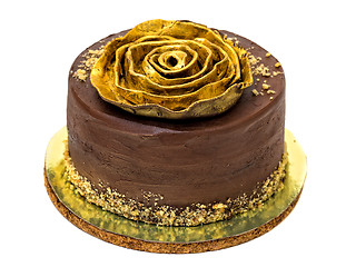 Image showing Chocolate Cake Sprinkled with Crumbs and Golden Rose