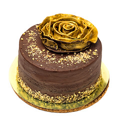 Image showing Chocolate Cake Sprinkled with Crumbs and Golden Rose