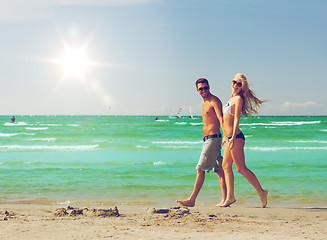 Image showing couple walking on the beach