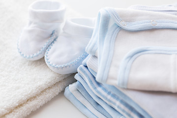 Image showing close up of baby boys clothes for newborn on table