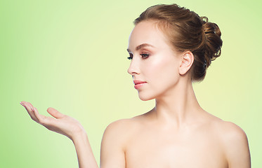 Image showing smiling young woman face and shoulders