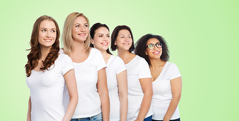 Image showing group of happy different women in white t-shirts