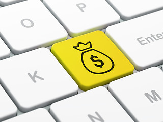 Image showing Banking concept: Money Bag on computer keyboard background